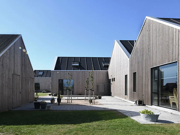 Lunawood facade in natural weathered gray color